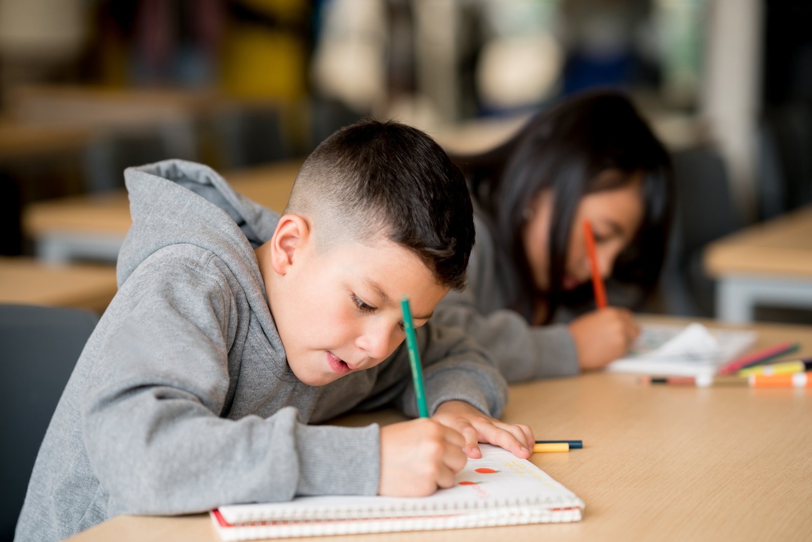 Kids studying at the school