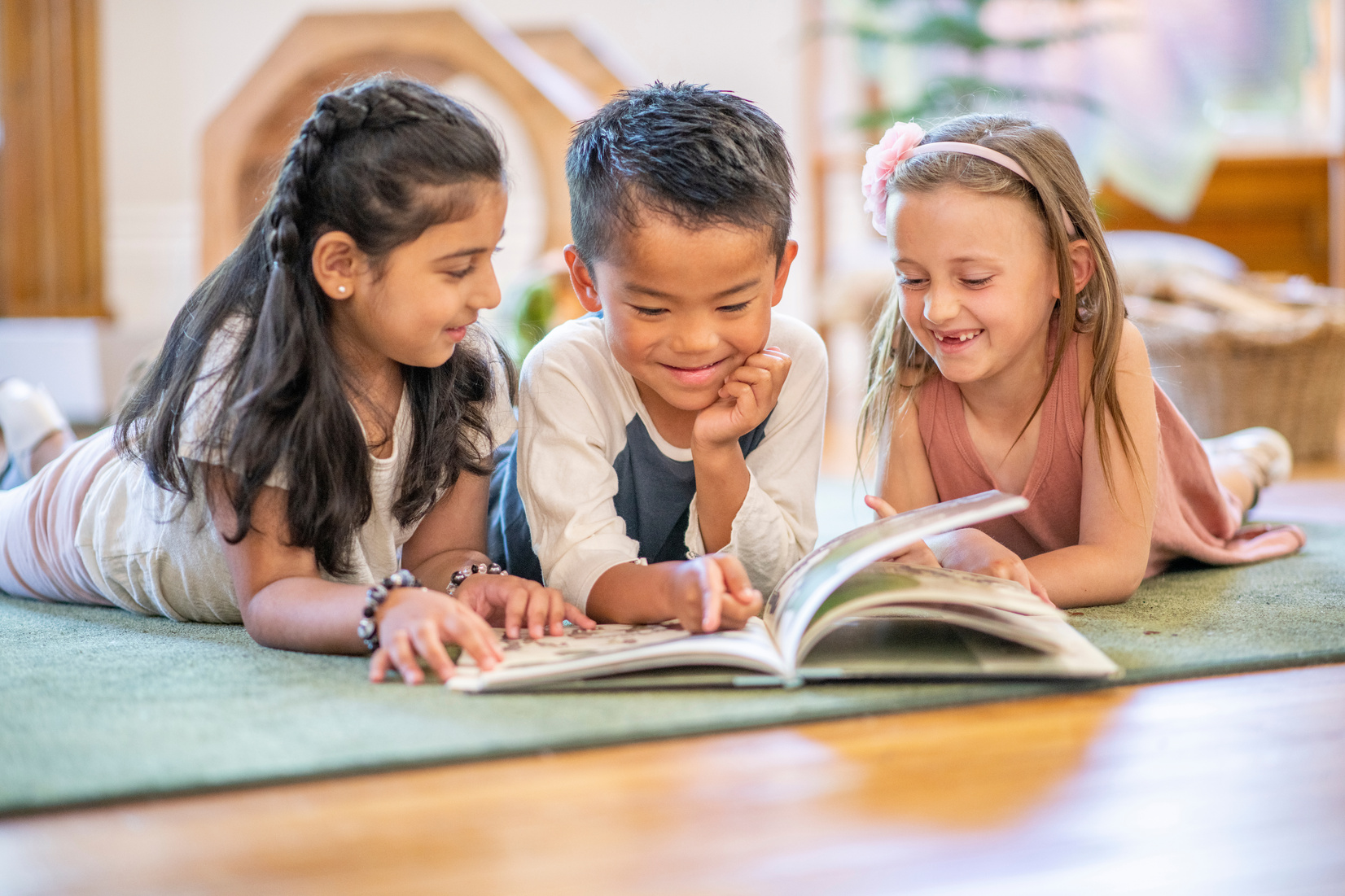 Kids reading on the floor