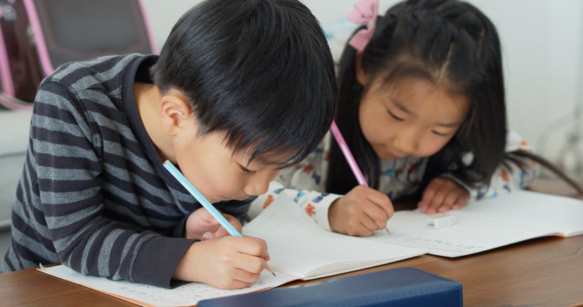 Japanese Kids Learning to Write